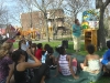 Sue shares the gospel message with kids in a park.