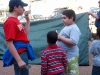 Justin witnessing to a few kids after the meeting.