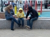 Rebecca and Laurence chat with a young girl after a meeting.