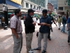 Russ and Nel witnessing to an adult in downtown Boston.