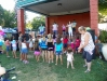 The Kids Praise Team leading children in dancing and song. Vivienne is all the way on the left. Juliana is in pink, third from the left.