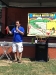 Me performing \'The Chemical Cross\' illusion that teaches the gospel. If you look at the water jug on the table, it is black, representing sin. All the \'good deeds\' in the white bottle just made the water darker.