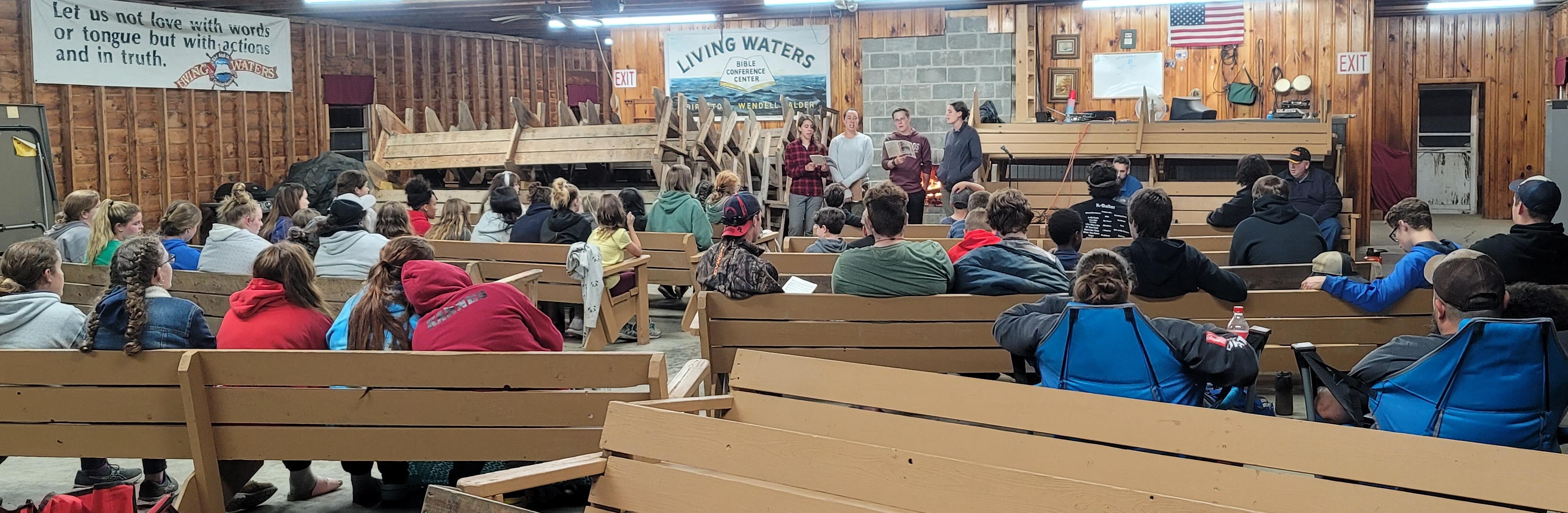 Perhaps my favorite night is "Testimony Night" when kiddos are encouraged to stand and tell what Jesus did for them that week.  Many give testimony of salvation!  In this photo some of the Counsellors were leading everyone in worship songs.