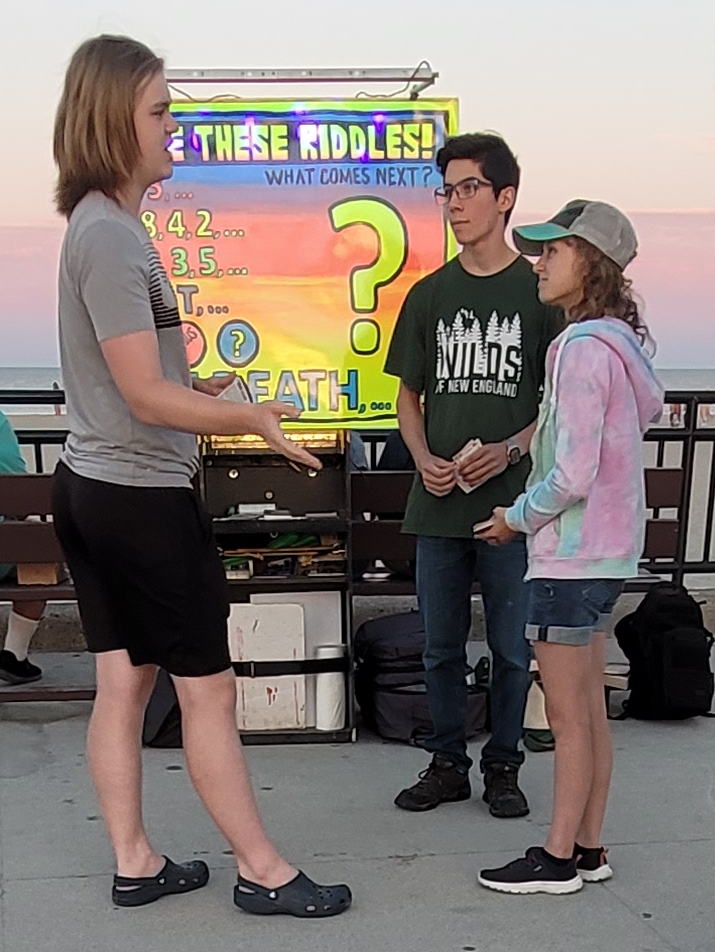 Two High-Schoolers sharing Jesus with a stranger at the beach (I am so proud of them)!  Chloe and George had a great conversation with Connor. Connor is an intelligent young man with his own ideas of morality.  Chloe and George brought him through some of the Ten Commandments to show Connor what God's idea of morality is, and that we've all failed it.  The young duo for Jesus shared the great news of Jesus dying for sinners, and rising from the dead. We must repent and believe.  Connor took a Gospel of John from them and said he'd read it and consider it.  Hey, if these young kids can share Jesus with a stranger, so can you! God can use anybody who loves Jesus and loves people. I'd like to help if you want to be a ready Ambassador for the King!